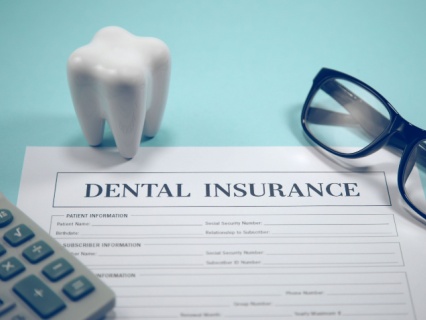 kid-grins-insurance-plans financial information
